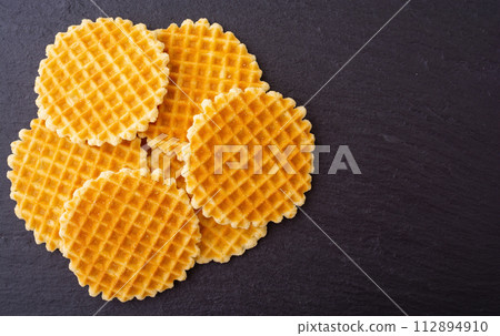Sweet golden Belgian waffles Sweet golden Belgian waffles 112894910