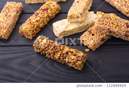 Healthy cereal bar from granola and dried berries 112894924