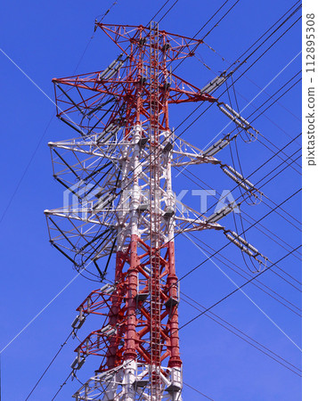 Tower rising in the blue sky 112895308