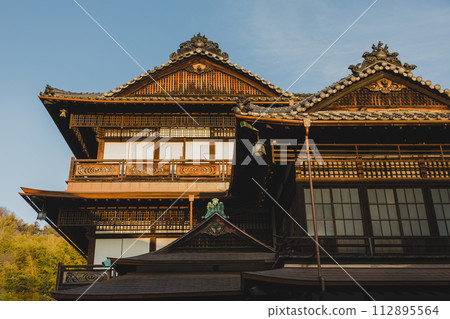 Dogo Onsen in the evening Dogo Onsen in the evening 112895564