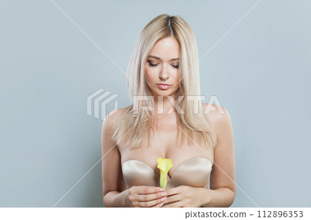 Sensual blonde model woman portrait. Facial treatment, cosmetology, skin care concept Sensual blonde model woman portrait. Facial treatment, cosmetology, skin care concept 112896353