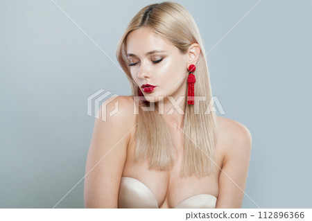 Nice female face. Young blonde woman on white background 112896366
