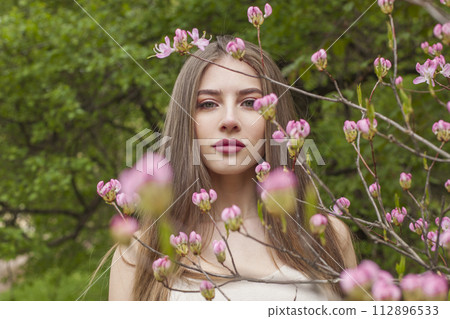 Gorgeous brunette woman portrait. Beautiful female model with long hair and make-up  112896533
