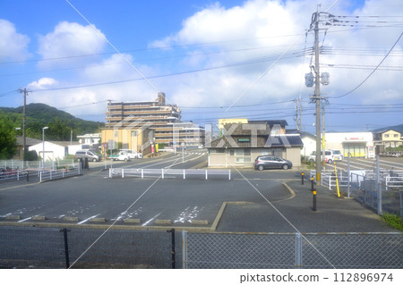View from the train window from Kanoya Station to Echizen-Maebaru Station on the Chikuhi Line (2022) 112896974