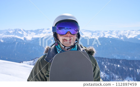Snowboarder in Winter Mountain Landscape 112897459