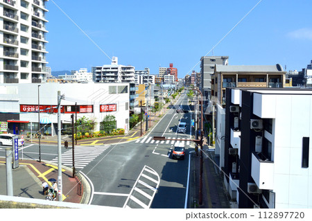 View from the train window from Meinohama Station to Fujisaki Station on the Fukuoka Airport Line View from the train window from Meinohama Station to Fujisaki Station on the Fukuoka Airport Line 112897720