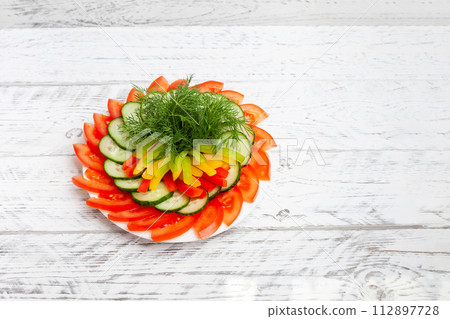 Beautiful sliced vegetables for the festive table Beautiful sliced vegetables for the festive table 112897728