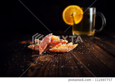 Orange peels in sugar. Candied fruit from orange 112897757