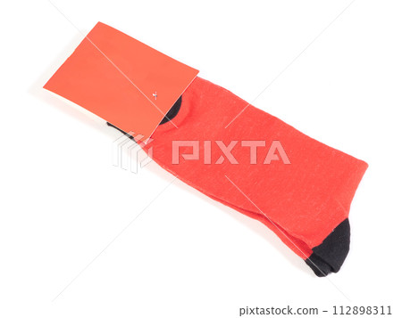 Pair of new red cotton socks isolated on white 112898311