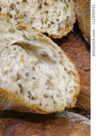 Freshly baked traditional multigrain bread 112898435