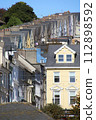 clustered houses in the city of Cobh, Ireland  112898592