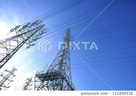 Japan's electric power cityscape: Japan's energy, light and shadow... Sun and power lines. In an era of hope for a new tomorrow... Japan's electric power cityscape: Japan's energy, light and shadow... Sun and power lines. In an era of hope for a new tomorrow... 112899338
