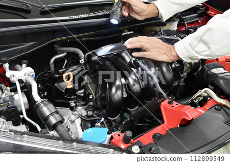 Car engine under maintenance 112899549