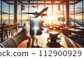 A hand holds a phone displaying a 3D airplane hologram, 112900929