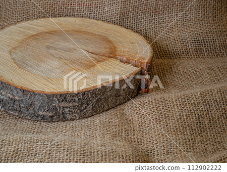round wooden stand stand isoiled on a white background selective focus round wooden stand stand isoiled on a white background selective focus 112902222
