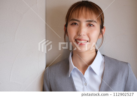 Portrait of a woman working from home Portrait of a woman working from home 112902527