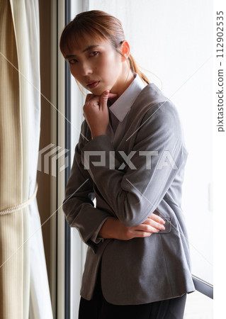 Portrait of a woman working from home Portrait of a woman working from home 112902535