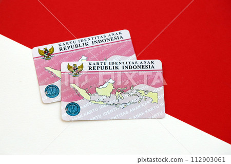 Indonesia child identity card Kartu Identitas Anak or KIA card. ID document for indonesian children close up Indonesia child identity card Kartu Identitas Anak or KIA card. ID document for indonesian children close up 112903061