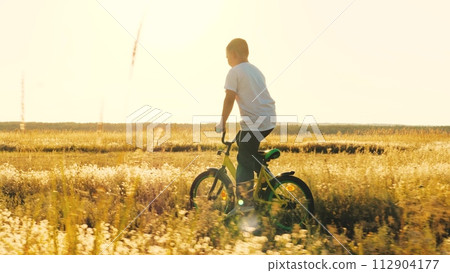 happy boy learning ride bicycle park, child schoolboy son rides bicycle sunset, happy family, cardio exercise machine, healthy active game child schoolboy sunset, spin wheel, turn foot pedal, son happy boy learning ride bicycle park, child schoolboy son rides bicycle sunset, happy family, cardio exercise machine, healthy active game child schoolboy sunset, spin wheel, turn foot pedal, son 112904177
