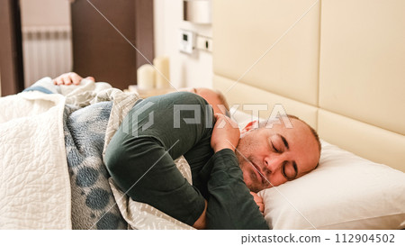 Happy gay couple sleeping relaxed at home 112904502