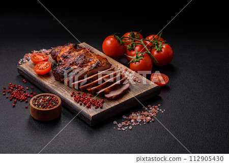 Fresh juicy delicious beef steak on a dark background 112905430