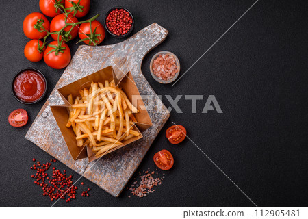 Delicious crispy golden fries with salt and spices Delicious crispy golden fries with salt and spices 112905481