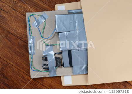 Mail bomb IED - Improvised Explosive Device with c4 and cell phone module in envelope Mail bomb IED - Improvised Explosive Device with c4 and cell phone module in envelope 112907218