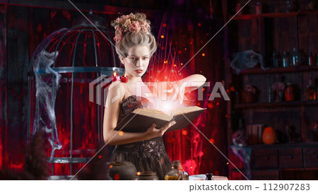 Charming woman witch flowers in hair vintage black Charming woman witch flowers in hair vintage black 112907283