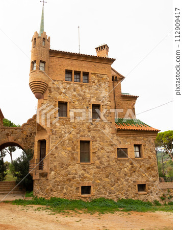 View of exterior of House of Master and School of Colonia Guell 112909417