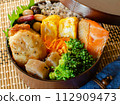 Cheese meatballs and salmon bento 112909473