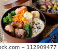 Chicken bento box marinated in soy sauce and koji 112909477