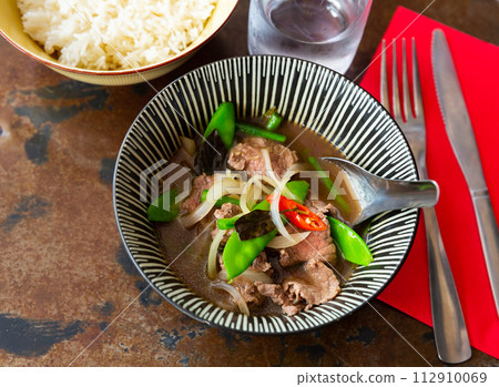 Popular dish of Thai cuisine is beef with basil Popular dish of Thai cuisine is beef with basil 112910069