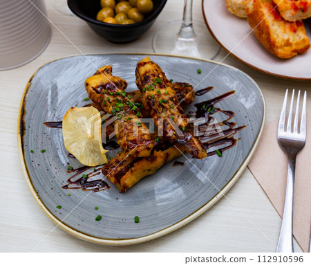 Eggplant in tempura with cane honey 112910596