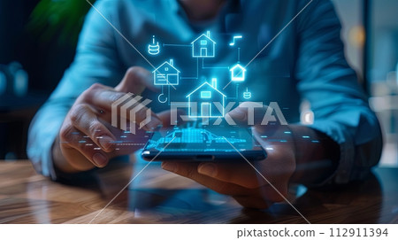 smartphone with digital hologram of smart home system and real estate icons, closeup view smartphone with digital hologram of smart home system and real estate icons, closeup view 112911394