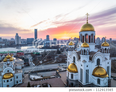 Spring Yekaterinburg, Temple on Blood and Church of St Nicholas in sunset. Aerial view of Yekaterinburg, Russia. Translation of text on the temple 112913565