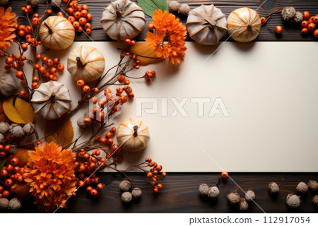 Mockup white blank paper sheet with autumn orange flowers, top view, floral template empty card flat lay for design with copy space Mockup white blank paper sheet with autumn orange flowers, top view, floral template empty card flat lay for design with copy space 112917054