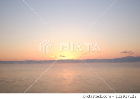 Beautiful gradation sea and sky scenery Beautiful gradation sea and sky scenery 112917122