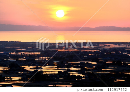 Rice fields and sunset from Funami Castle ruins Rice fields and sunset from Funami Castle ruins 112917552