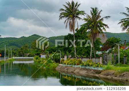 Houses on the river bank. Houses on the river bank. 112918206