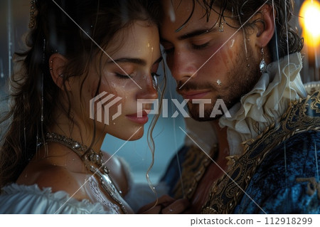 Capturing passion in the renaissance, victorian, and baroque era: a timeless love story portrayed by a couple in vintage attire, embracing the elegance, romance, and nostalgia of historical periods. 112918299