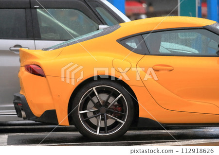 domestic yellow sports car domestic yellow sports car 112918626