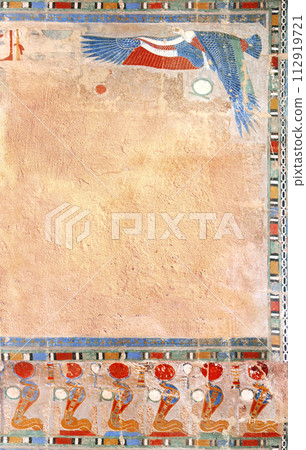 Vertical background with Ancient Egyptian Colorful Mural Wall Painting and stucco wall texture. Frame in egyptian style with Figure of eagle and cobras. Mock up template. Copy space for text Vertical background with Ancient Egyptian Colorful Mural Wall Painting and stucco wall texture. Frame in egyptian style with Figure of eagle and cobras. Mock up template. Copy space for text 112919721
