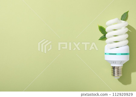 A light bulb on a light background A light bulb on a light background 112920929