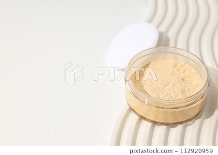 Face powder, light shade on a light background. Face powder, light shade on a light background. 112920959