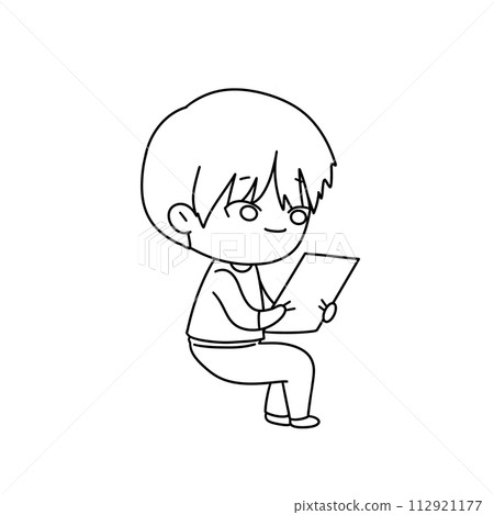 A boy is sitting on a chair and reading a book A boy is sitting on a chair and reading a book 112921177