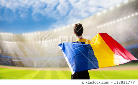 Romania football team supporter on stadium. Romania football team supporter on stadium. 112921777