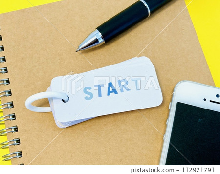 Word book with START written on it 112921791