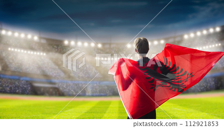 Albania football team supporter on stadium. Albania football team supporter on stadium. 112921853
