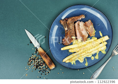 Barbecue steak with asparagus. Barbecue steak with asparagus. 112922396