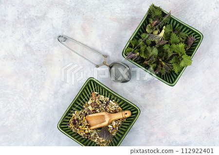 Herbal tea with nettle, healing herbs. Herbal tea with nettle, healing herbs. 112922401